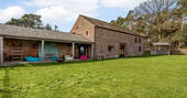 High Barn - exterior with lounging area, Edenhall Estate, Penrith, Cumbria