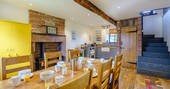 High Barn - kitchen with wood burner, Edenhall Estate, Penrith, Cumbria