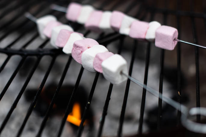 Marshmallows sizzling on the fire pit at The Bothy at High Barn in Cumbria