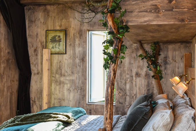 King-size bed inside Faraway Treehouse in Cumbria 