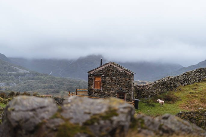 The Hog House bothy - visitor at the door, Coniston, Cumbria