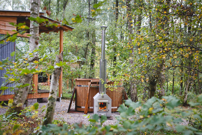 The Hut hot tub trees