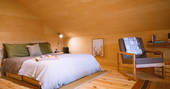 The Woodshed cabin bedroom, Hopehill Woods at Penrith, Cumbria
