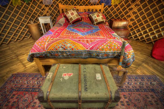 Colourful interiors of Netherby Woodland Yurt in Cumbria