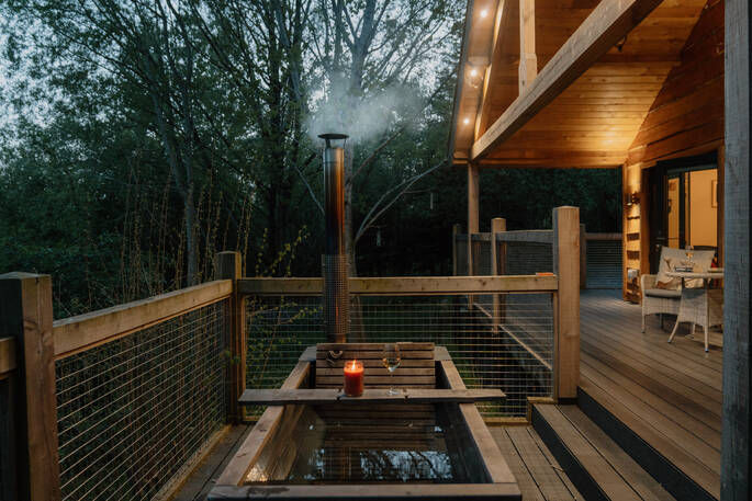 Edens Vale Lodge cabin outdoor hot tub during the night, Penrith, Cumbria, England