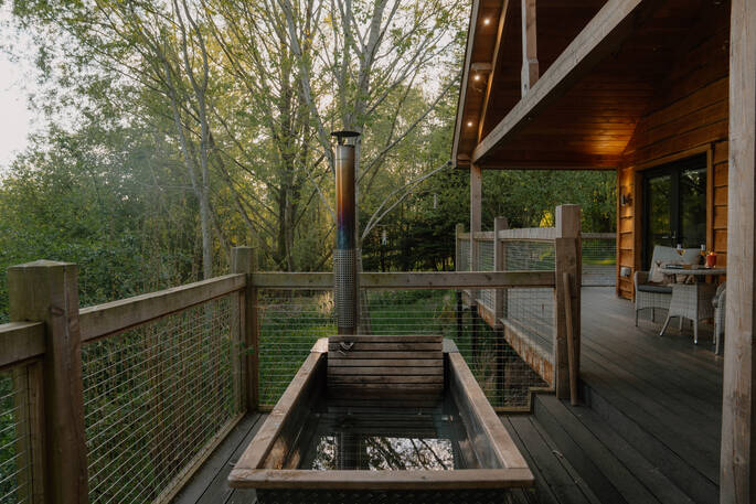 Edens Vale Lodge cabin outdoor hot tub on the balcony, Penrith, Cumbria, England