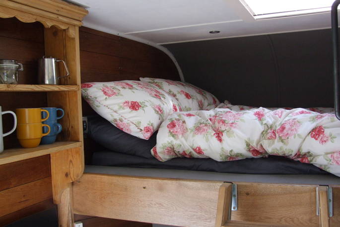 King-size bed on mezzanine level inside Martin Green at Trent Adventure 