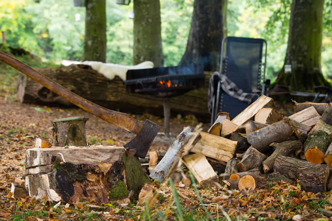 Chop some wood to keep cosy by the wood burner at Fairfield, Acorn Farm