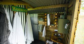 Fluffy robes to keep cosy after you use the incredible outdoor shower amongst the trees at Fairfield, Acorn Farm