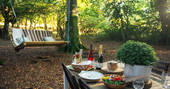 Dine al fresco on a sunny summer's evening at Acorn Farm in Devon