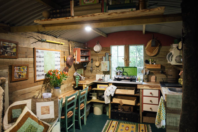 Fully equipped kitchen facilities inside the shepherd's hut at Turners Woodland Suite at Acorn Farm