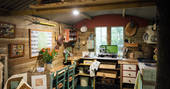 Fully equipped kitchen facilities inside the shepherd's hut at Turners Woodland Suite at Acorn Farm