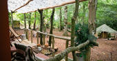 Sit back on the outdoor decking and enjoy a game of chess at Turners Woodland Suite in Acorn Farm