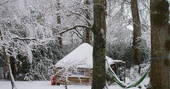 The yurt at Turners Woodland Suite in the snow, Acorn Farm in Devon