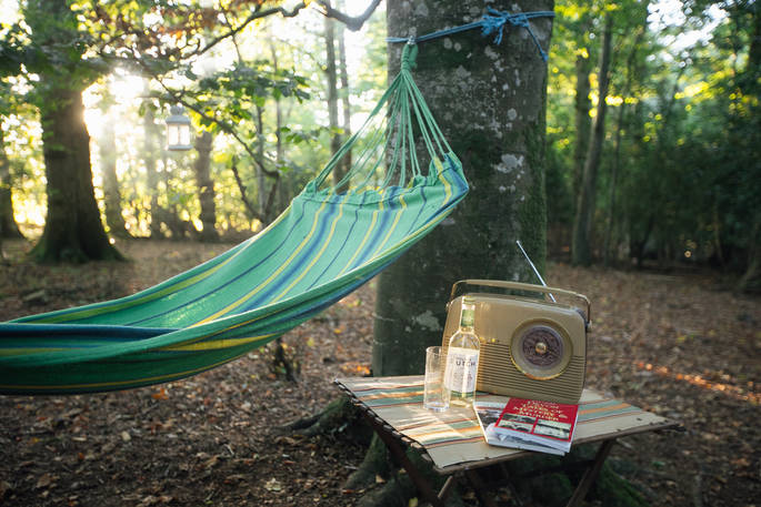 Turn on the retro style radio, lay on the hammock and relax at Turners Woodland Suite at Acorn Farm in Devon