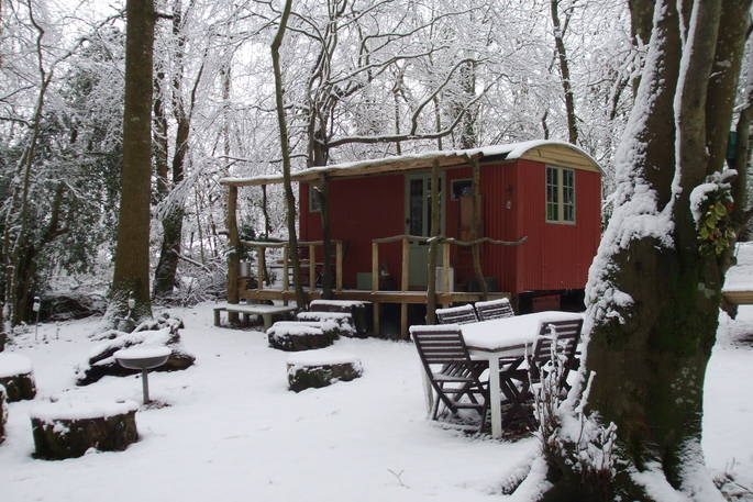 Turners Woodland Suite Shepherd's Hut in the snow, Acorn Farm in Devon