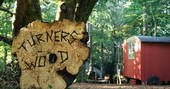 Wooden sign for Turners Wood at Acorn Farm
