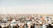 The Brixham Marina with its many boats floating in the water