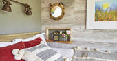 Enjoy long lie-ins from Brownscombe Cabin's cosy double bed