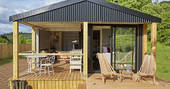 Let the breeze flow into Brownscombe Cabin in Devon, with views from the bed and copper bath tub