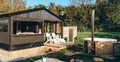 Let the breeze flow into Brownscombe Cabin in Devon, with views from the bed and copper bath tub