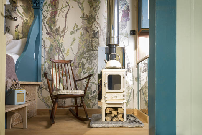 Lounge in the rocking chair in front of the woodburner, toasty and warm inside Brownscombe Tabernacle 