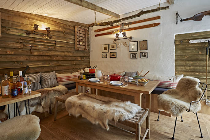 The cosy communal cabin room, perfect for a late night game of cards
