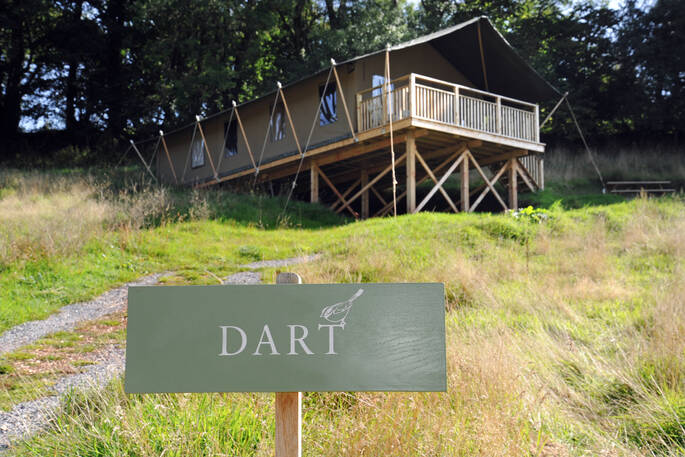  Brownscombe Luxury Glamping in Devon with Dart sign outside safari tent for six