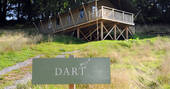  Brownscombe Luxury Glamping in Devon with Dart sign outside safari tent for six