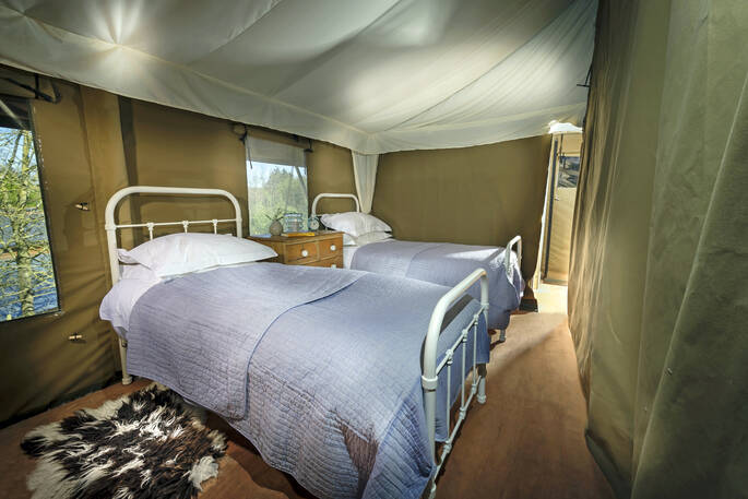 Snooze under canvas in Dart safari tent's comfy twin beds