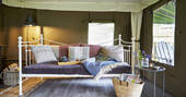 The day bed - a perfect place to relax in Dart safari tent, Devon