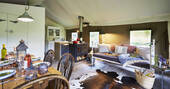 The spacious but warm living space at the Dart safari tent, Brownscombe in Devon