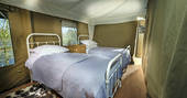 Sleep under canvas in Tamar's twin beds at Brownscombe in Devon 