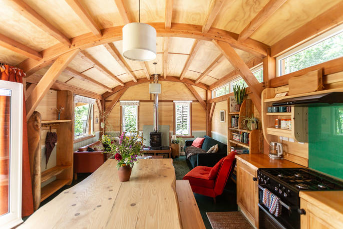 The Devon Den cabin interior with woodburner, Germansweek, Devon