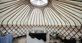 The cosy and comfortable interior of little links at devon yurt  