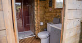 The Pheasant's Retreat treehouse shower room, Crediton, Devon, England