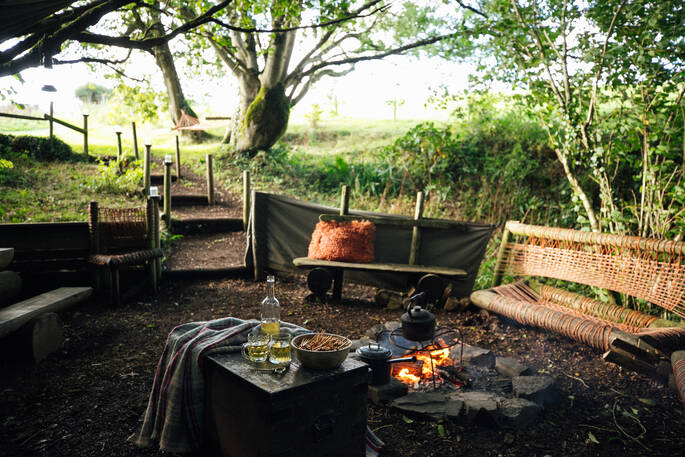 Sit around the campfire at Vintage Vardos in Devon