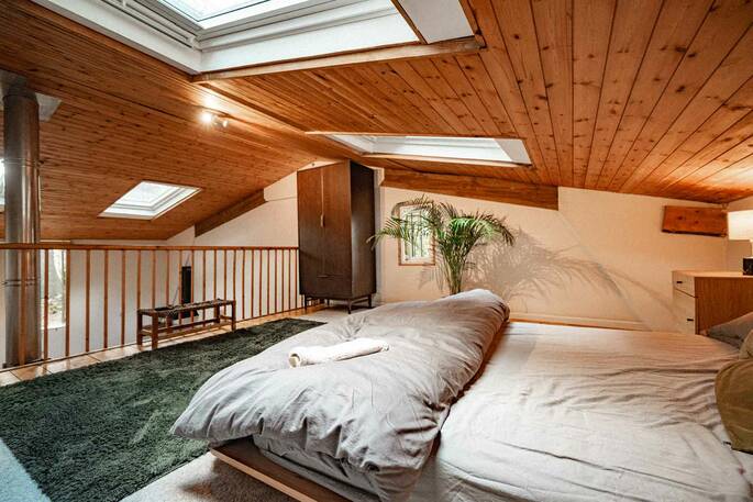 King size bed up on the mezzanine