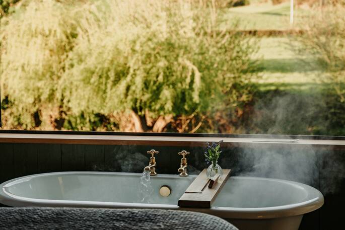 Bedroom with a bath tub