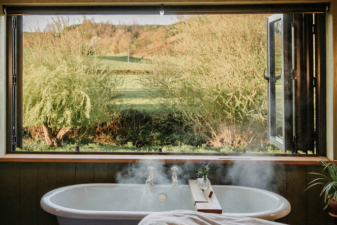 Bedroom with a bath tub