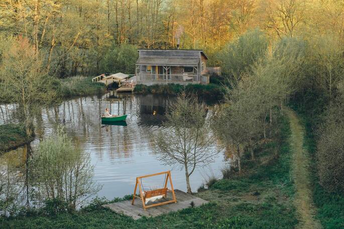 Gosling Lodge exterior showing pond
