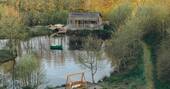 Gosling Lodge exterior showing pond