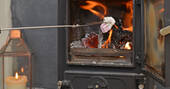 Toast marshmallows on the cosy wood burner at Gosling Lodge in Devon