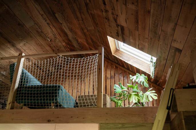 Seating area upstairs with a skylight