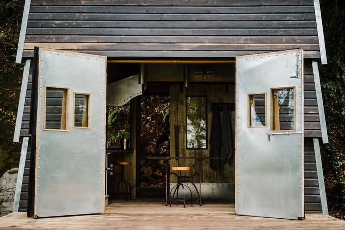humble bee honeyside down cabin oakhampton devon england uk glamping exterior kitchen doorway