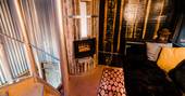 humble bee beehive cabin devon england uk glamping interior living space with electric heater