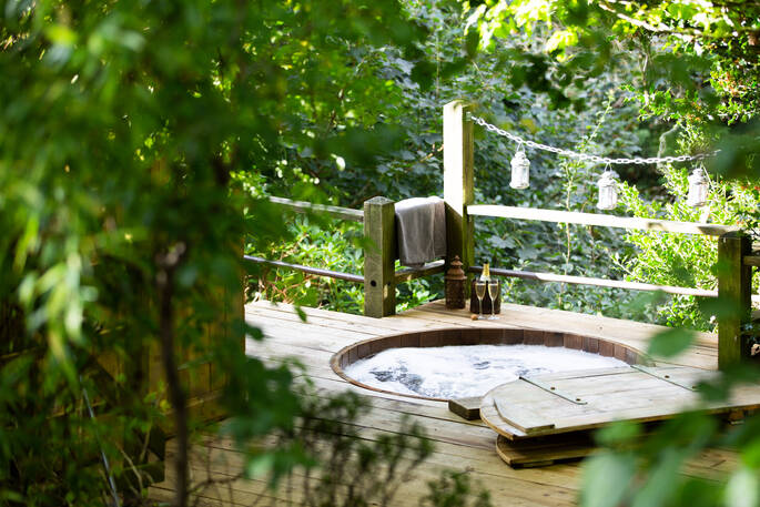 Relax and unwind in the wood fired hot tub at Honeyside Down in Devon