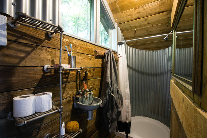Bathroom at The Bird Box with shower and sink in Honeyside Down 