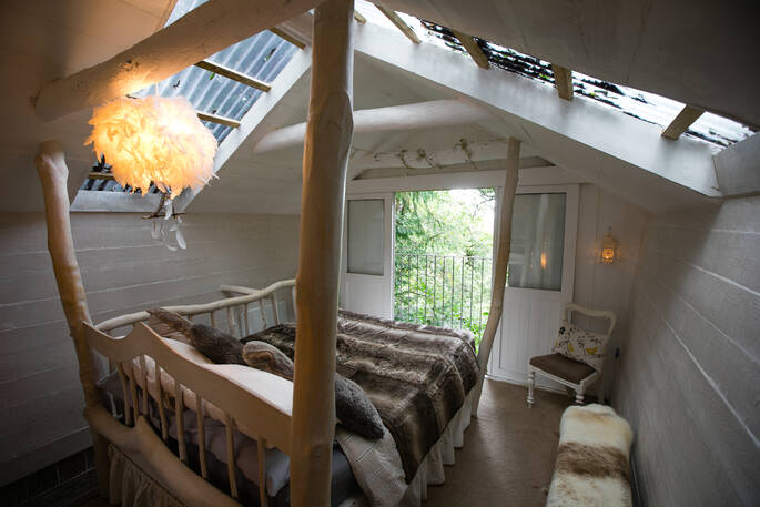 The bedroom in bird box at Honeyside Down in Devon 