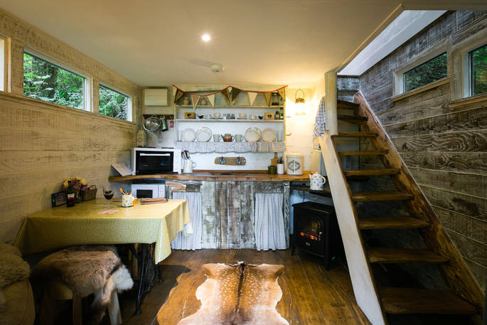 The Bird Box downstairs with kitchen and seating area at Honeyside Down in Devon 